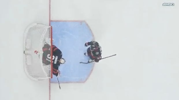 Travis Hamonic tells Anton Forsberg he's been pulled from the game.